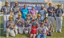  ?? –Supplied photo ?? WINNERS: EY Oman with the Auditors Cricket Cup.