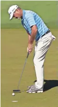  ?? GETTY IMAGES ?? Jerry Kelly approaches his putt at the first hole. Kelly finished tied for second.