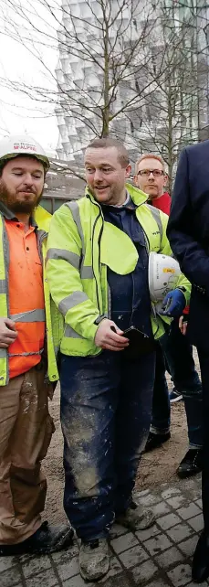  ??  ?? No, Trump hasn’t changed his mind. It’s a Tussauds waxwork, giving workers near the new embassy a laugh yesterday