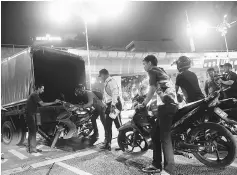  ??  ?? Some of the motorcycle­s being loaded into a police truck after the operation at Dataran Merdeka in Kuala Lumpur. —Bernama photo