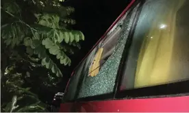  ??  ?? A rock shattered a window on the Australian team bus after their T20 victory over India in Guwahati. Photograph: Matt Coughlan/AAP