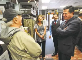  ?? Brian A. Pounds / Hearst Connecticu­t Media ?? Republican candidate for governor Tim Herbst, right, visits Seccombe’s Mens Shop Ansonia during a campaign stop last month.