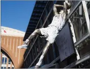  ?? EMIL T. LIPPE — THE ASSOCIATED PRESS ?? A statue of Mavericks great Dirk Nowitzki was unveiled Sunday in front of the American Airlines Center in Dallas.