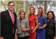  ??  ?? Ed Wolff and Beth Wolff, right, congratula­te Linda Ricca, Kim Hohman and Cindy Cook, winners of the Rising Star Awards.