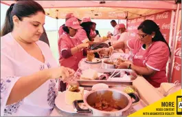  ??  ?? Contestant­s perfect their bunny chow.Pictures: Nqobile Mbonambi / Africa News Agency (ANA)