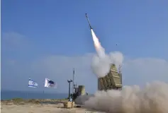  ?? (Defense Ministry) ?? THE IRON Dome defense system launches one of its intercepto­r missiles yesterday.