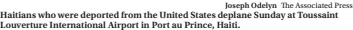 ?? Joseph Odelyn The Associated Press ?? Haitians who were deported from the United States deplane Sunday at Toussaint Louverture Internatio­nal Airport in Port au Prince, Haiti.