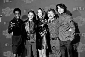  ??  ?? Cast members (left to right) Caleb McLaughlin, Noah Schnapp, Millie Bobby Brown, Gaten Matarazzo and Finn Wolfhard pose at the premiere for the second season of ‘Stranger Things’ in Los Angeles, California, on Oct 26, 2017. — Reuters file photo