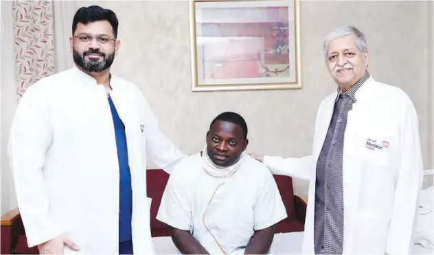  ?? ?? ±
Dr. Abdul Aneez and Dr. Kishore Chandra Prasad with Gibril Ceesay.