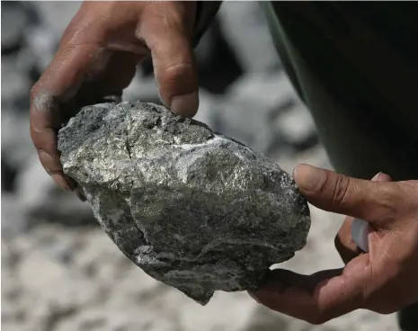  ?? Reuters ?? A rock from Al Amar gold mine near Riyadh. Saudi Arabia aims to attract $170 billion to its mining sector by 2030