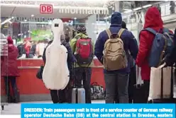  ??  ?? DRESDEN: Train passengers wait in front of a service counter of German railway operator Deutsche Bahn (DB) at the central station in Dresden, eastern Germany, during a warning strike of rail workers yesterday. —AFP