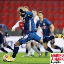  ??  ?? MAKING A MARK Lacazette rolls in his penalty, and, before kickoff, players and officials take a knee