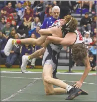  ?? H John Voorhees III / Hearst Connecticu­t Media ?? Killingly's Danny Charron and Xavier's Michael Rapusno wrestle in the finals for the 106-pound weight class in the State Open on Saturday.