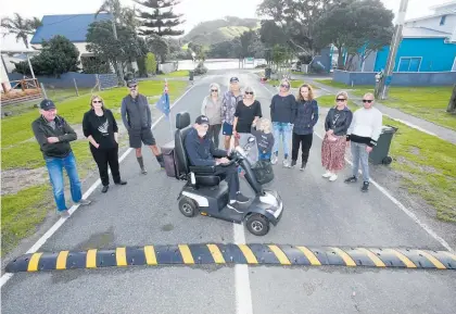  ?? Photo / Michael Cunningham ?? Pataua South residents installed speed bumps to keep their community safe from speeding drivers.
