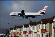  ??  ?? A BA Boeing 747 flies over Heathrow at 600ft yesterday