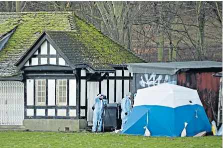  ??  ?? Police investigat­ors in Finsbury Park, north London, where the body of Iuliana Tudos was found in an outbuildin­g by the sports ground in the middle of the park