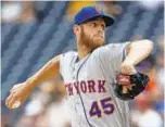  ?? THE ASSOCIATED PRESS ?? Mets starting pitcher Zack Wheeler went six innings and had the game’s only RBI.