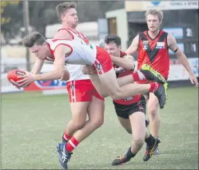  ??  ?? GOOD GRAB: Ararat’s Tom Mills takes a strong mark against Stawell during Wimmera Football League’s inaugural Good Friday match at North Park in Stawell. Picture: PAUL CARRACHER