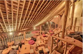  ??  ?? Relaxed ambience: Soaring rafters above and cosy beanbags below