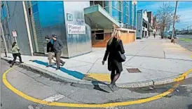  ?? DAVID L. RYAN/BOSTON GLOBE PHOTO ?? The Supreme Court last month said buffer zones in Massachuse­tts, such as this one painted outside a Planned Parenthood clinic in Boston, were unconstitu­tional.