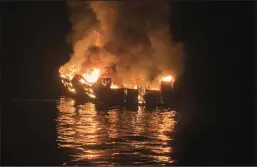  ?? SANTA BARBARA FIRE DEPT./TNS ?? A boat caught fire off the Ventura County coast on Sept. 2 near Santa Cruz Island. Thirty four people were killed in the fire.