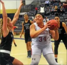  ?? GREGG SLABODA — TRENTONIAN PHOTO ?? Pennington’s Leah Johnson drives to the basket during Saturday’s game against Stuart.