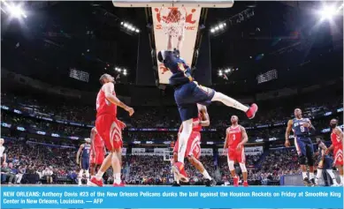  ??  ?? NEW ORLEANS: Anthony Davis #23 of the New Orleans Pelicans dunks the ball against the Houston Rockets on Friday at Smoothie King Center in New Orleans, Louisiana. — AFP