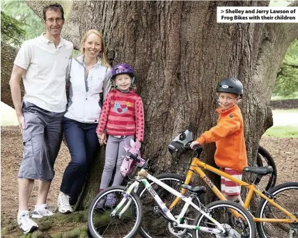  ??  ?? > Shelley and Jerry Lawson of Frog Bikes with their children