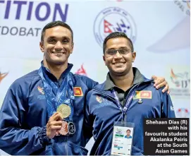  ??  ?? Shehaan Dias (R) with his favourite student Akalanka Peiris at the South Asian Games