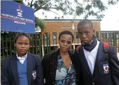  ?? Picture: Masi Losi ?? Beauty Letswalo outside Northcliff High School. The family’s bid to compel the Gauteng education department to admit her children Modjadji and Mojalefa suffered a setback in the South Gauteng High Court.