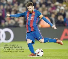  ?? — AFP ?? Messi scores on a penalty kick during the Copa del Rey quarterfin­al second leg match.