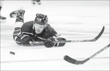  ?? Kyusung Gong Associated Press ?? KINGS LEFT WING Kyle Clifford hits the ice in the second period against the Dallas Stars at Staples Center.