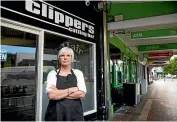  ?? VANESSA LAURIE/STUFF ?? Hairdresse­r Paula Richards, who owns Clippers Cutting Bar, said the town’s CBD is very quiet.