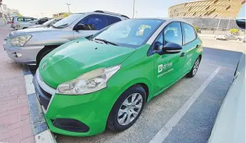  ?? Virendra Saklani/Gulf News ?? A Udrive vehicle at a parking lot in Dubai. Cars bearing the ekar and udrive branding are starting to show up more frequently, as riders take to the pay-by-the-minute usage these platforms allow.