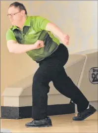  ?? JASON SIMMONDS/JOURNAL PIONEER ?? Kevin Ramsay of Tyne Valley intently follows the ball down the lane after making a shot during the Special Olympics Canada 2018 bowling championsh­ips at Credit Union Place in Summerside.