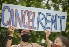  ?? Ed Jones/AFP via Getty Images ?? Demonstrat­ors attend a rally calling for an extension of New York’s eviction ban until 2022 and the cancellati­on of rent, in lower Manhattan on Wednesday.