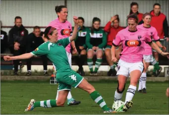  ??  ?? Megan Bourque of Cork City stretches in this tussle with Edel Kennedy of Wexford Youths.