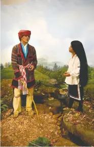  ?? STAFF PHOTO BY BEN BENTON ?? A diorama depicting the Cherokee Sequoyah and his daughter Ayoka is part of the exhibits at the Sequoyah Birthplace Museum in Vonore, Tenn. Sequoyah, born in 1776, invented the Cherokee Syllabary and a written language for his people.