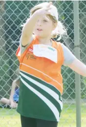  ??  ?? Olivia Boughey throws the discus.