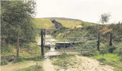  ??  ?? The collapse of part of the coal tip at the Tower Colliery in Hirwuan following heavy rain during Storm Callum