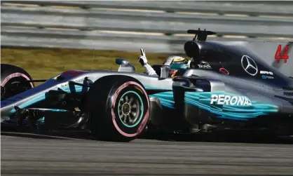  ?? Photograph: Tee/LAT/Rex/Shuttersto­ck ?? Lewis Hamilton celebrates taking his 11th pole position of the F1 season, for the United States Grand Prix at the Circuit of the Americas in Austin, Texas.