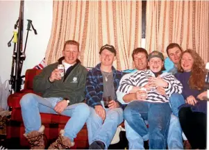  ??  ?? Left, Hayward with friends on a skiing trip prior to his accident. Below left, on holiday in the UK during the 2015 Rugby World Cup.