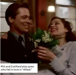  ??  ?? Pitt and Cotillard play spies who fall in love in “Allied.”