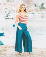  ?? DREAMSTIME ?? Puddle pants are women’s wide-leg, intentiona­lly oversized pants that “puddle” at the ankle.