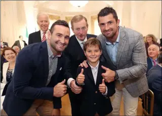  ??  ?? Vice President of the United States Joe Biden’s grandson Hunter meeting Taoiseach Enda Kenny and Irish Rugby stars Dave and Rob Kearney with Vice-President Joe Biden looking on at Farmleigh House for a farewell luncheon on the last day of his trip to...