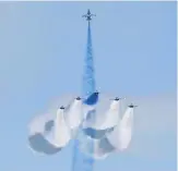  ?? ?? Mmembers of South Korea’s ‘Black Eagle’ aerobatics team perform during an aerial display.