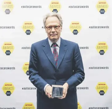  ?? ?? The of Richmond receives the Issigonis Trophy at the Autocar Awards 2023