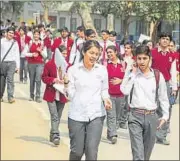  ?? PARVEEN KUMAR/ FILE ?? Students coming out of an exam centre in Gurgaon.