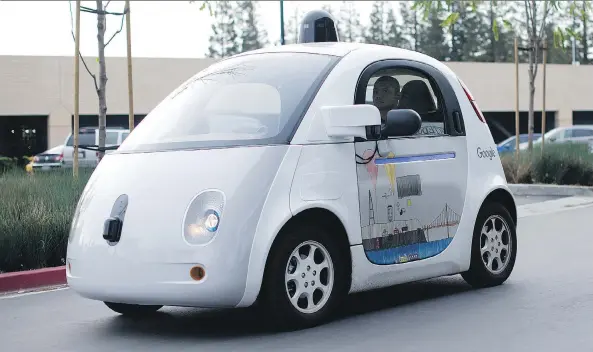  ?? NOAH BERGER/AFP/GETTY IMAGES/FILES ?? Alphabet’s “X” lab is responsibl­e for projects like Google’s self-driving cars. The lab is believed to account for the majority of the company’s losses.