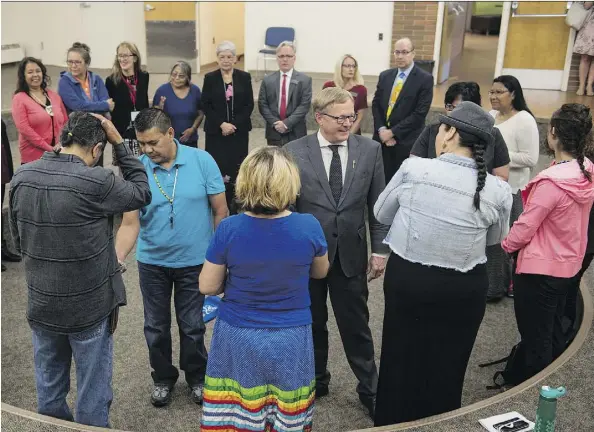  ?? SHAUGHN BUTTS ?? Education Minister David Eggen takes part in a smudge ceremony Tuesday at the University of Alberta, where he announced a three-year grant for the Canadian Indigenous Languages and Literacy Developmen­t Institute. The institute runs a summer program to educate teachers.